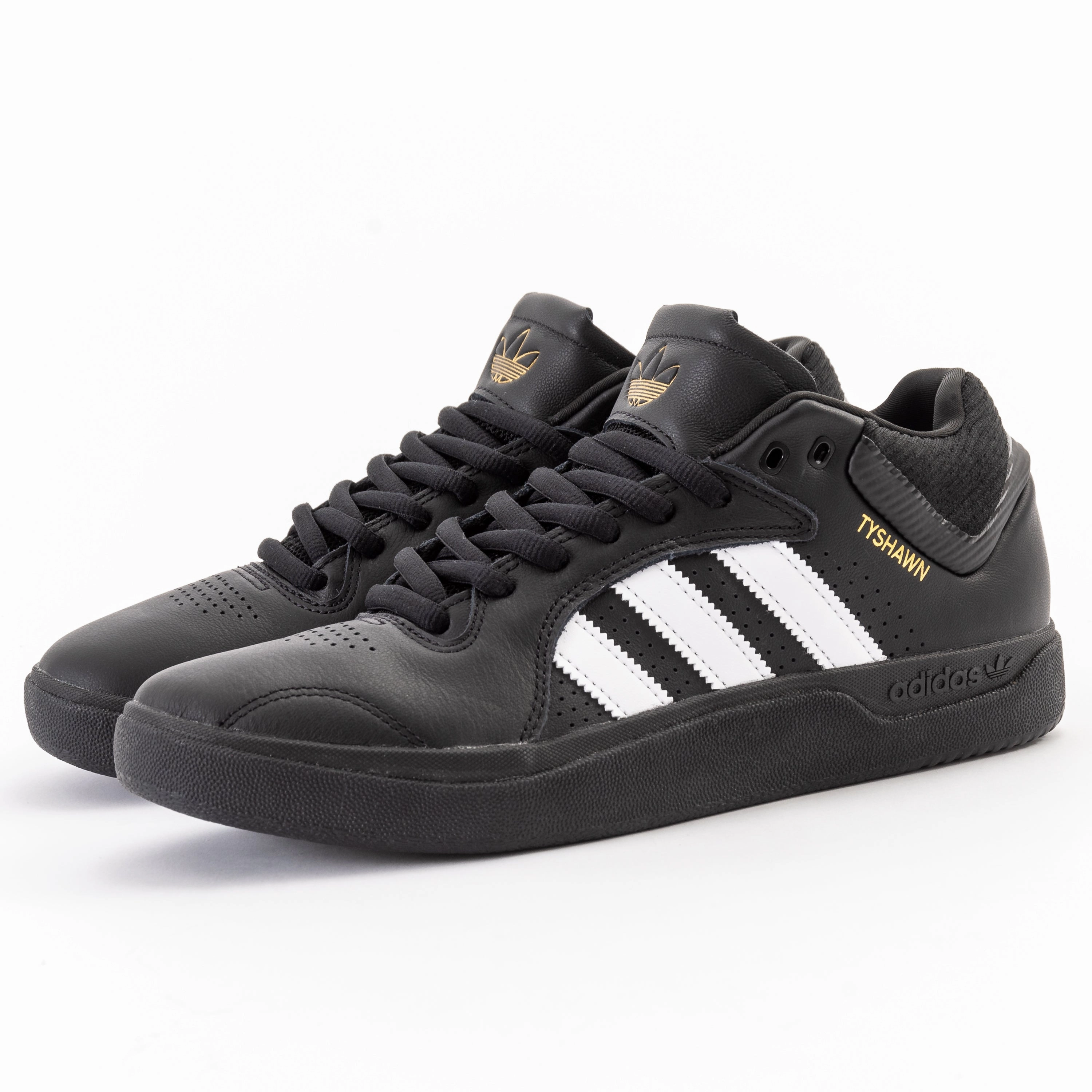 Adidas - Tyshawn (Black/White/Gold) running in a lagoon area shoes