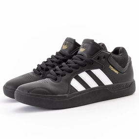 Adidas - Tyshawn (Black/White/Gold) running in a lagoon area shoes