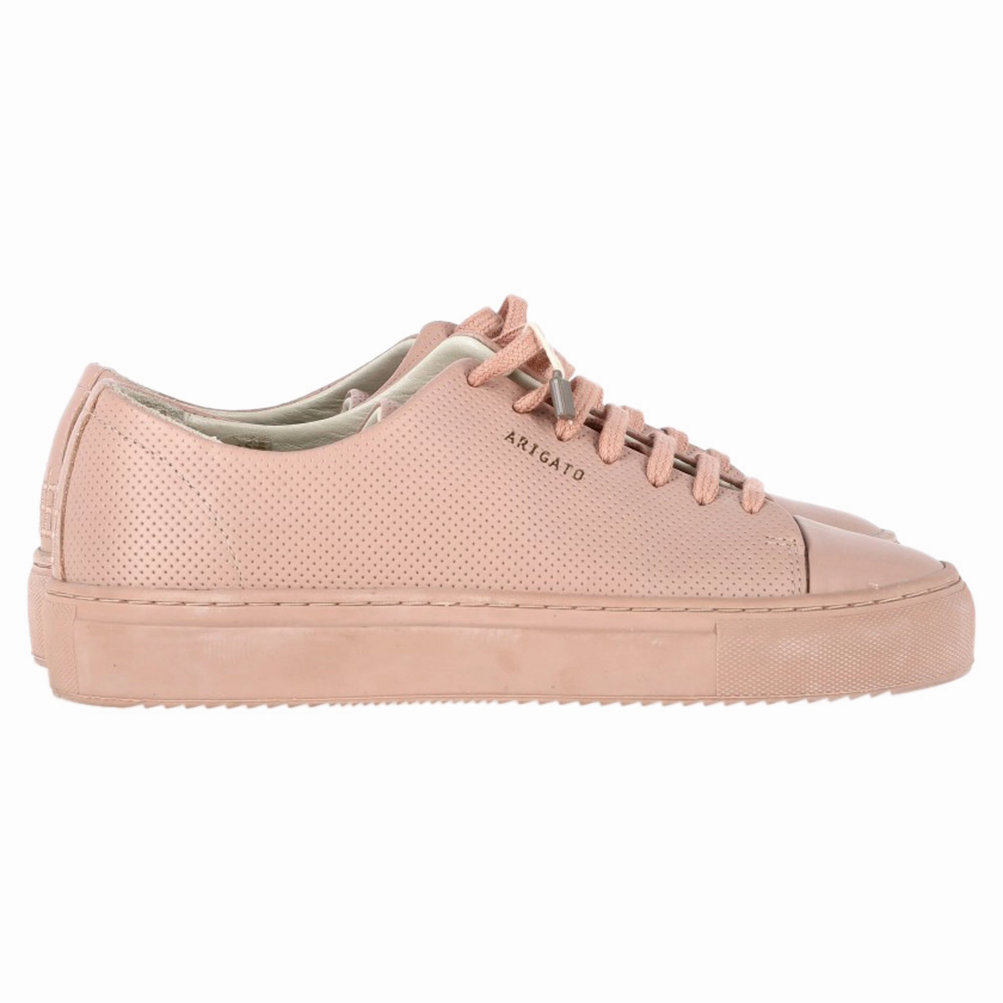 Smooth interior Axel Arigato Perforated Sneakers in Pink Leather