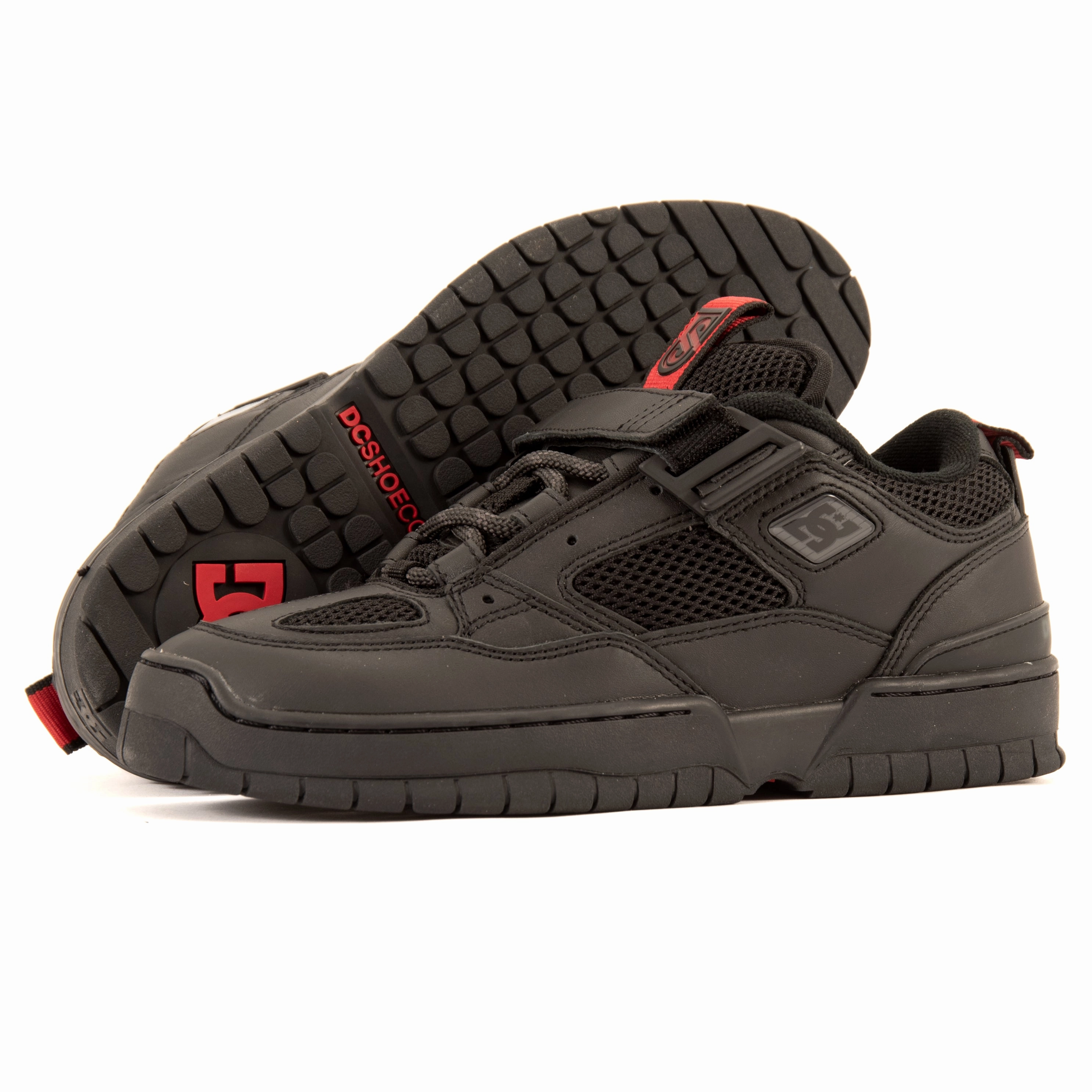 DC - JS-1 (Black/Red) *SALE running in a meadow shoes running in a marina area shoes