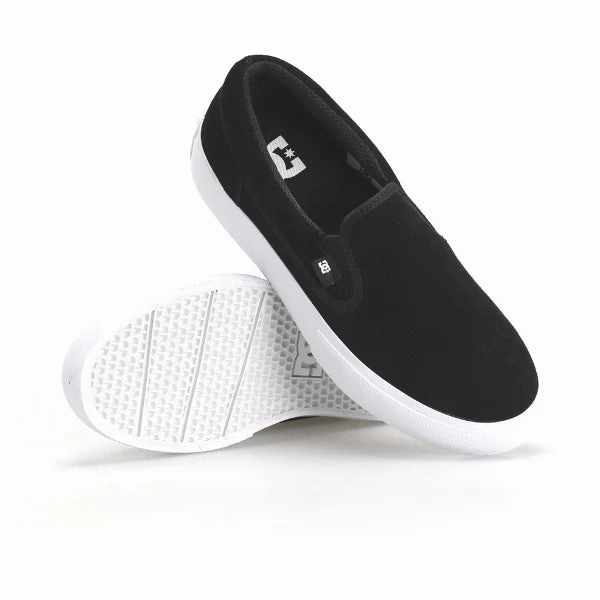 DC - Manual Slip-On SD Youth (Black/White) running in a hot spring area shoes