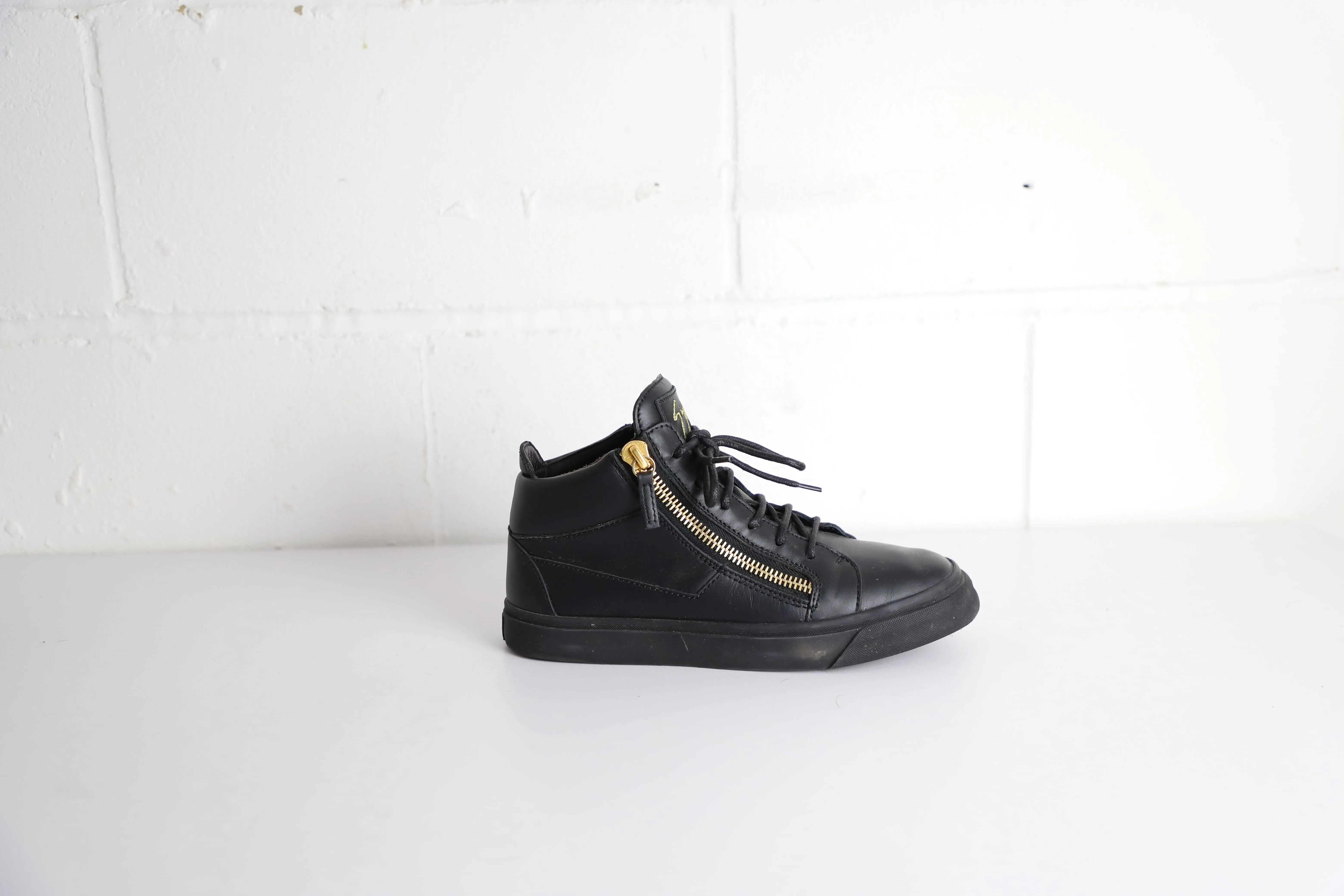 Casual Elegance Giuseppe Zanotti Frankie High-Top Sneakers in Black Leather