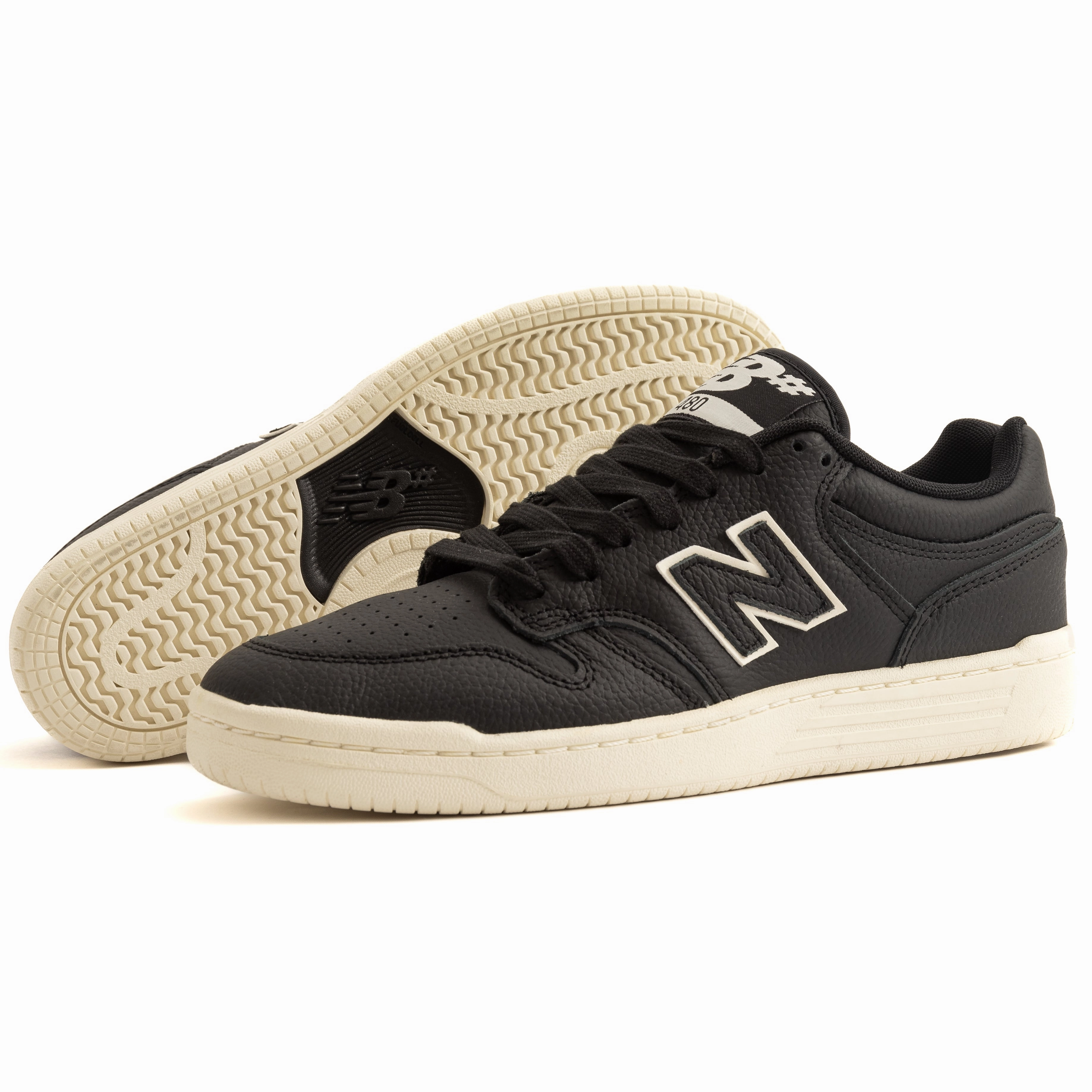 New Balance - 480 YIN (Black/White) running in stadium tracks shoes