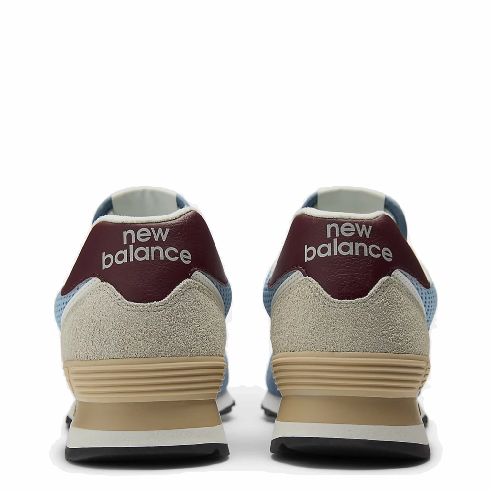 New Balance Women's 574 Sneaker in Shoreline Blue with Stillwater Shock Diffusing Midsole