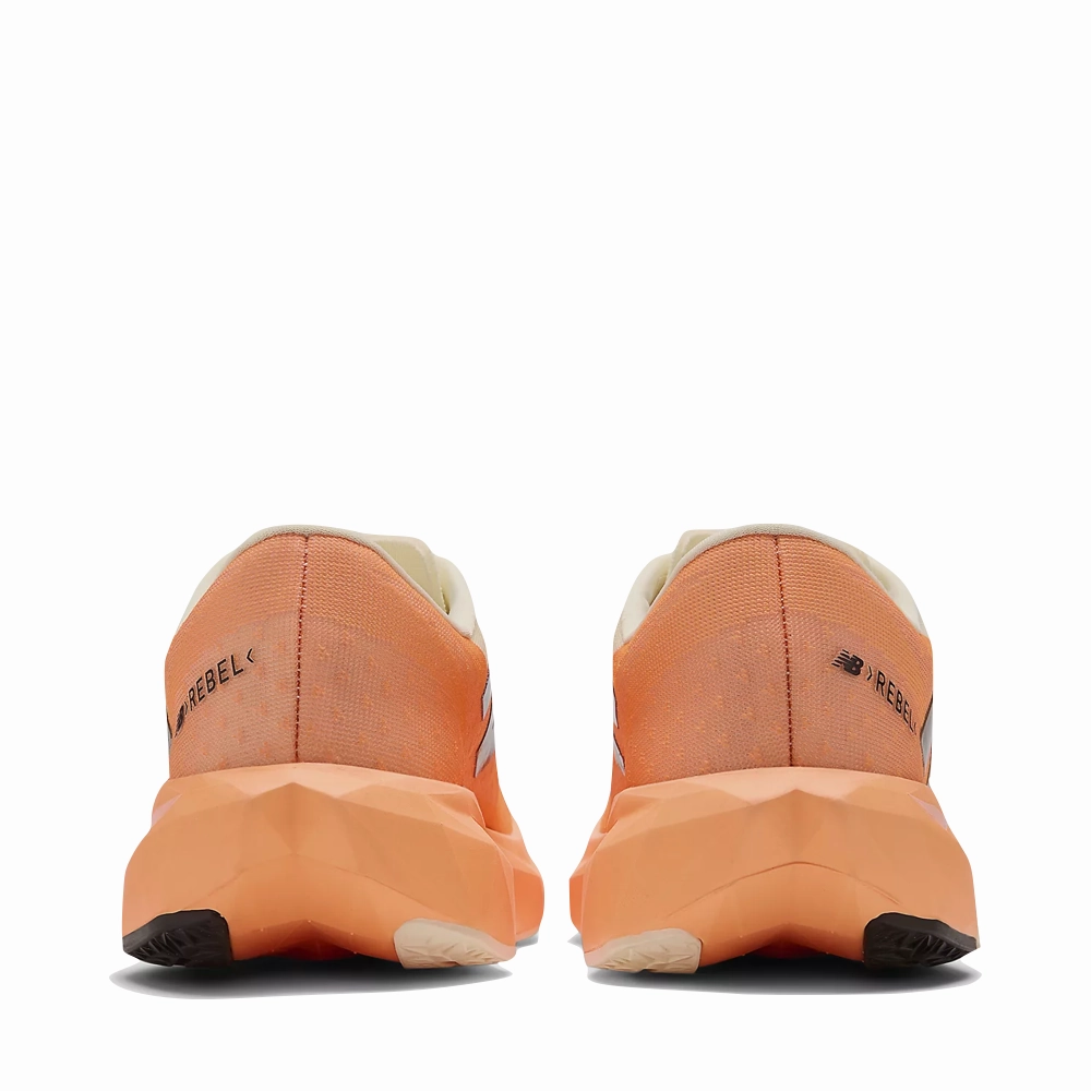 Zero Drop Platform New Balance Women's FuelCell Rebel v4 Sneaker in Hot Mango/Angora/Black