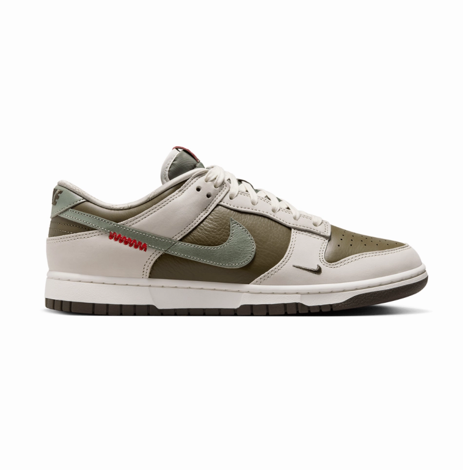 Nike Men's Dunk Low Retro Year Of The Snake Shoes - Medium Olive / Jade Horizon / Sail / Ironstone / University Red running in a canal area shoes