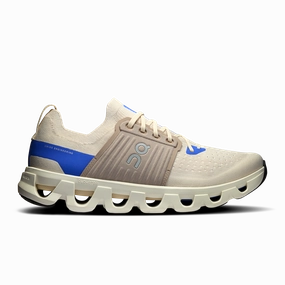 On Running Men's Cloudswift 4 Shoes - Cream / Cobalt Micro Perforated Lining running in a park trail