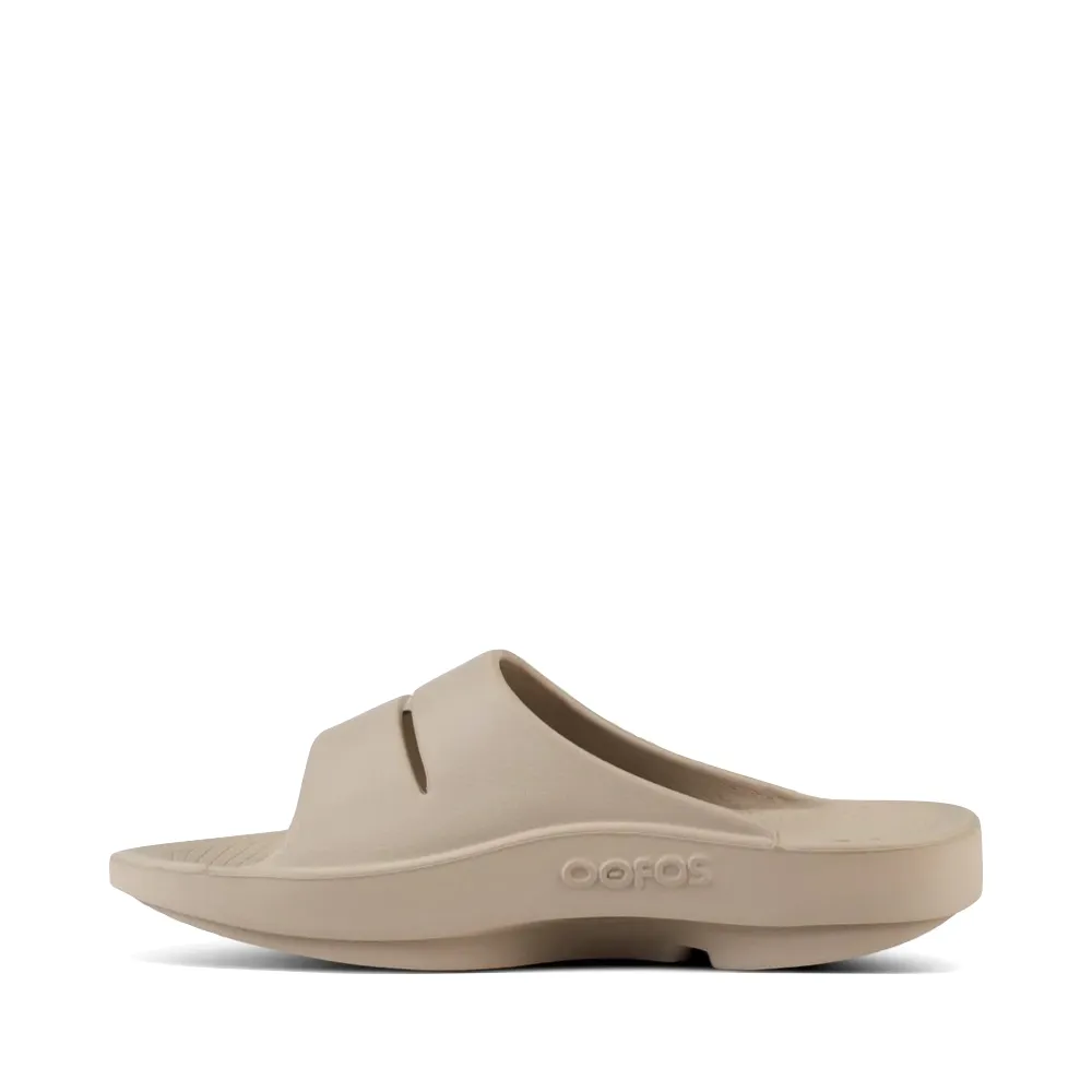 Subtle colors Sporty OOfos OOahh Slide Sandal in Nomad