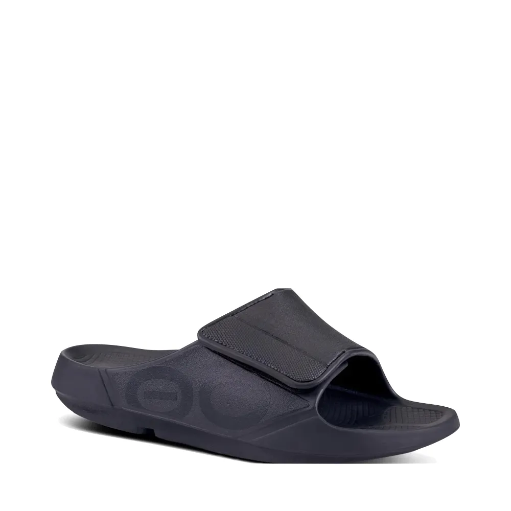 Style Comfort indoor mode OOfos OOahh Sport Flex Adjustable Slide Sandal in Black