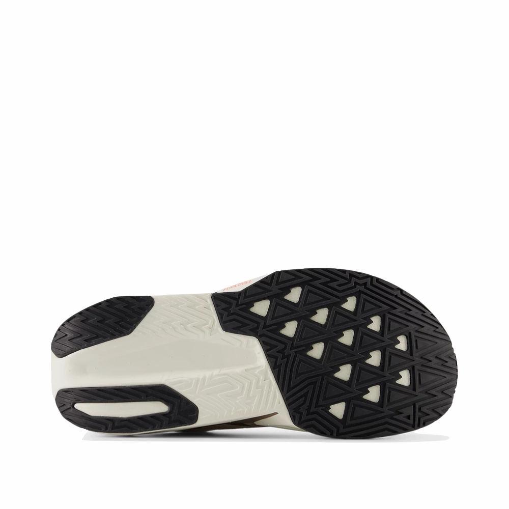 New Balance Women's FuelCell Rebel v5 Sneaker in Angora with Earth Shadow and Sea Salt Sock Entry Light Sole