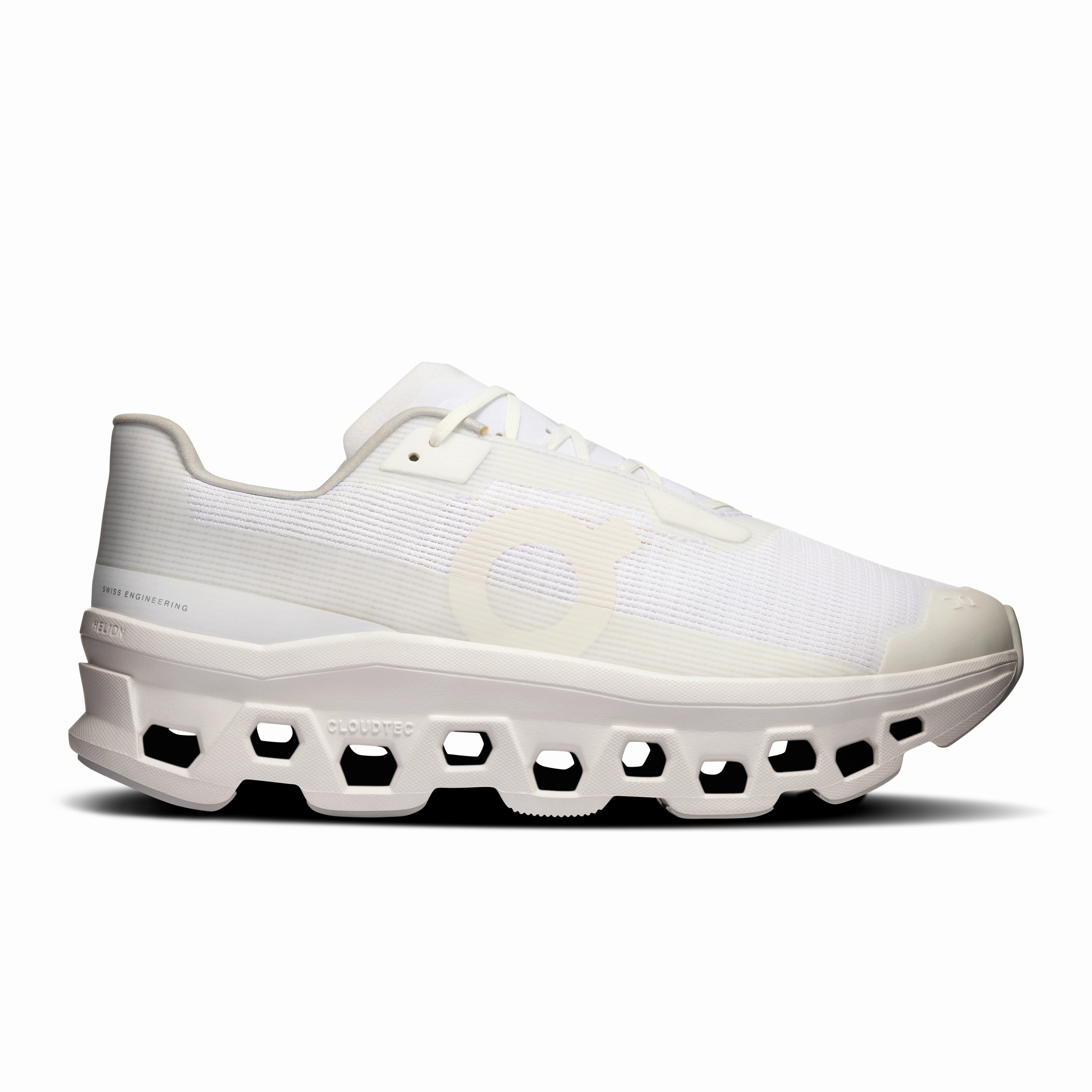 running in a color run On Running Men's Cloudmonster Void Shoes - White / White