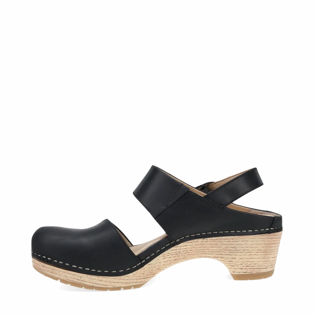 Dansko Women's Lucia Heeled Closed Toe Clog in Black Street Movement