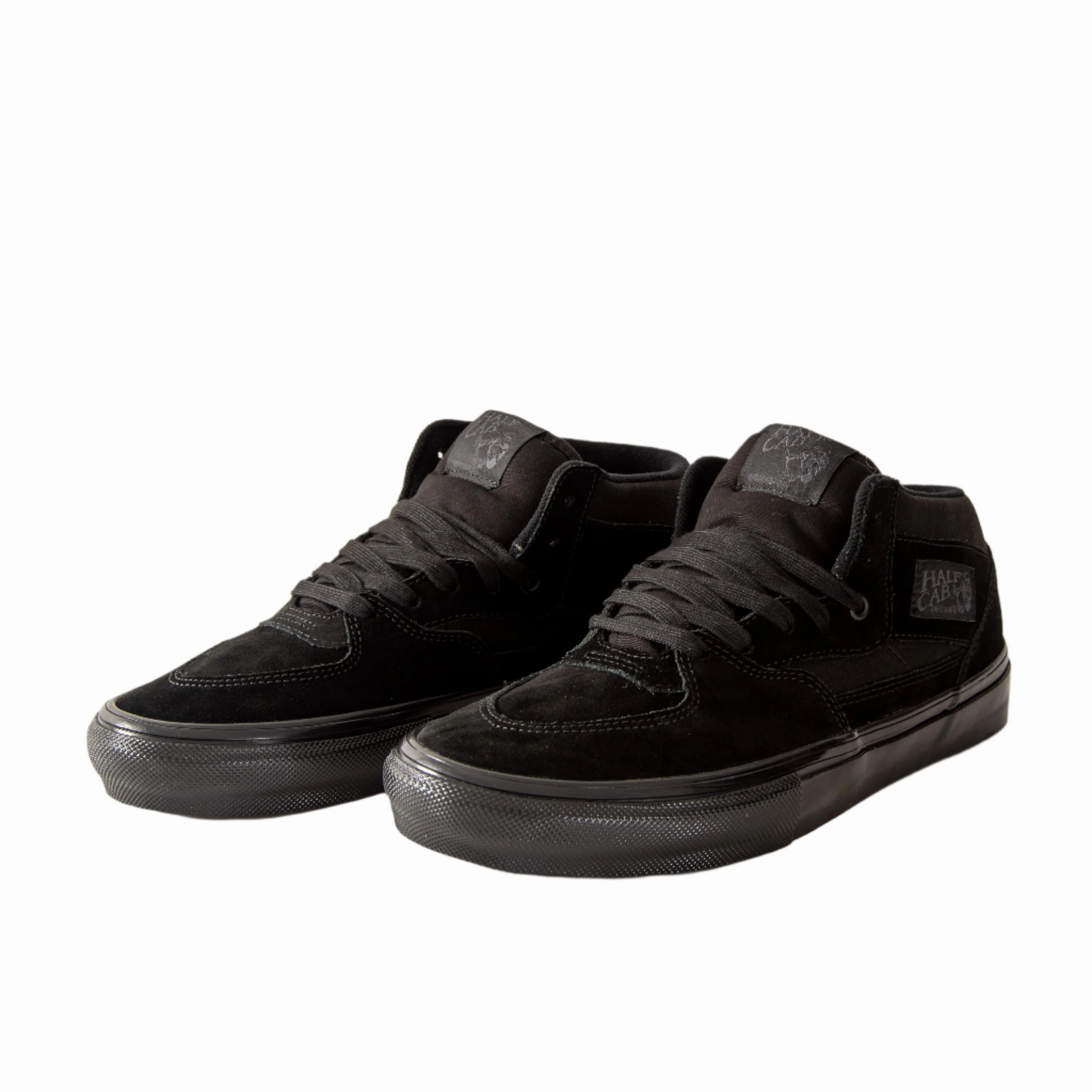 Vans - Skate Half Cab (Black) running in a race shoes
